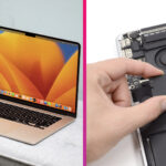 MacBook na stole a SSD v ruke používateľa