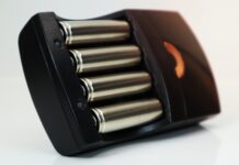 Rechargeable,Alkaline,Batteries,In,A,Battery,Charger,On,A,White