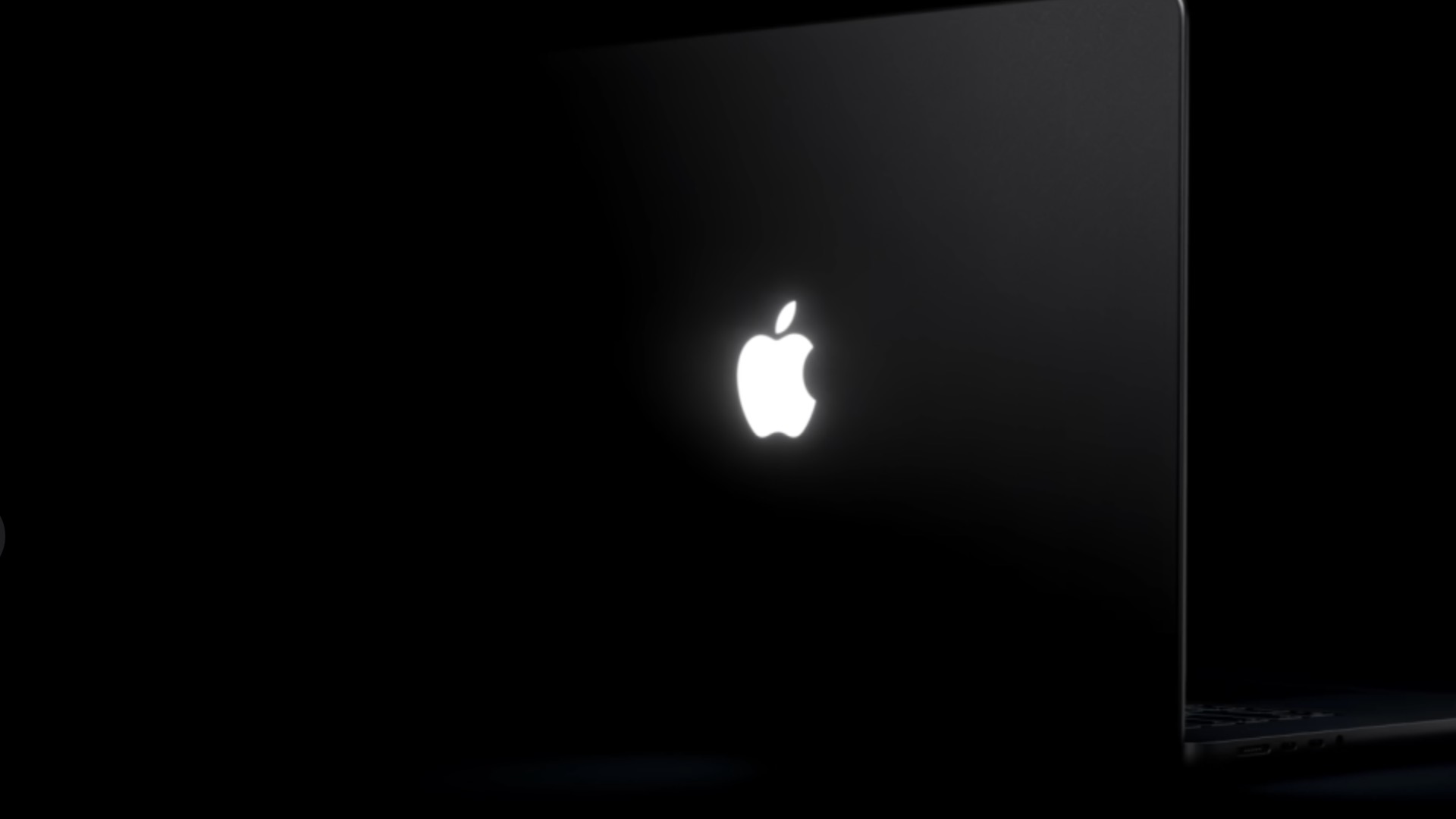 Svietiace logo MacBook Pro